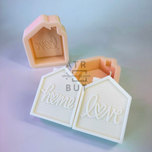 A set of silicone molds Home and Love houses